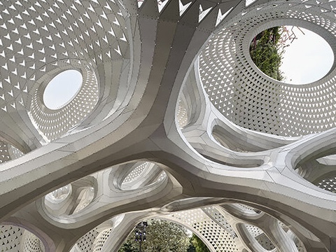 aluminum clads curved porsche pavilion by MARC FORNES / THEVERYMANY in singapore