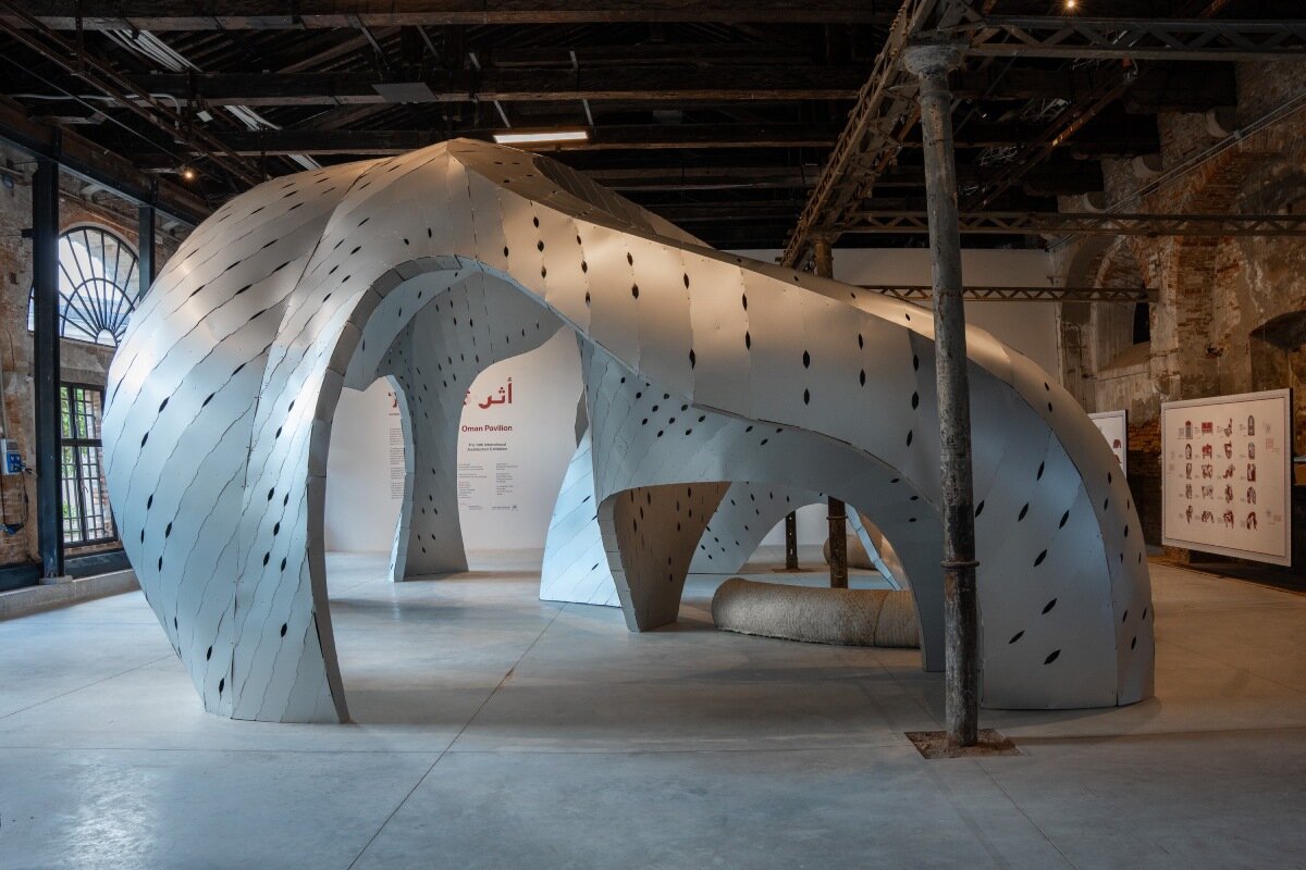 sinuous aluminum gathering space anchors venice architecture biennale